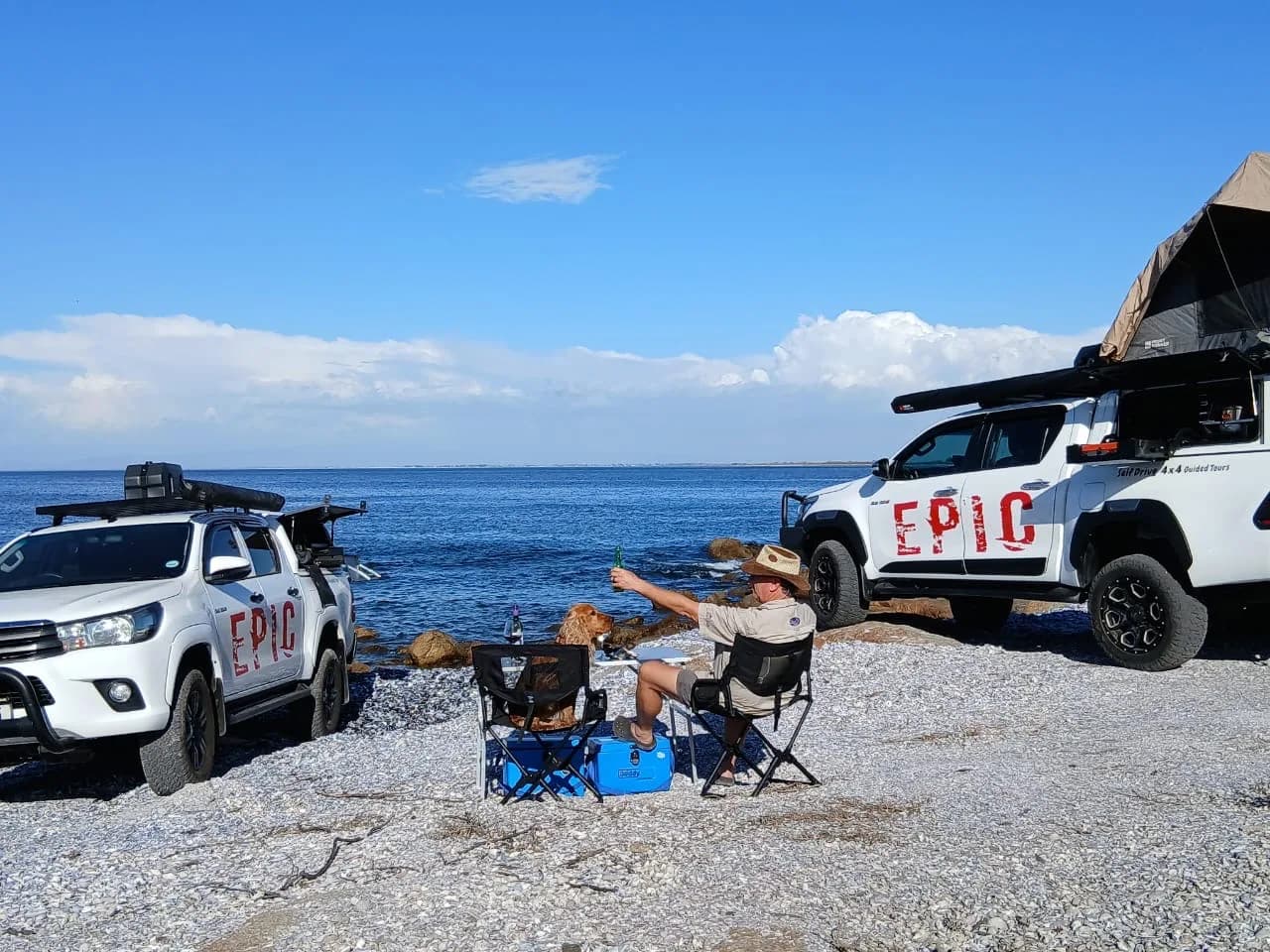 The 4×4 Epic Tours team beside the fleet
